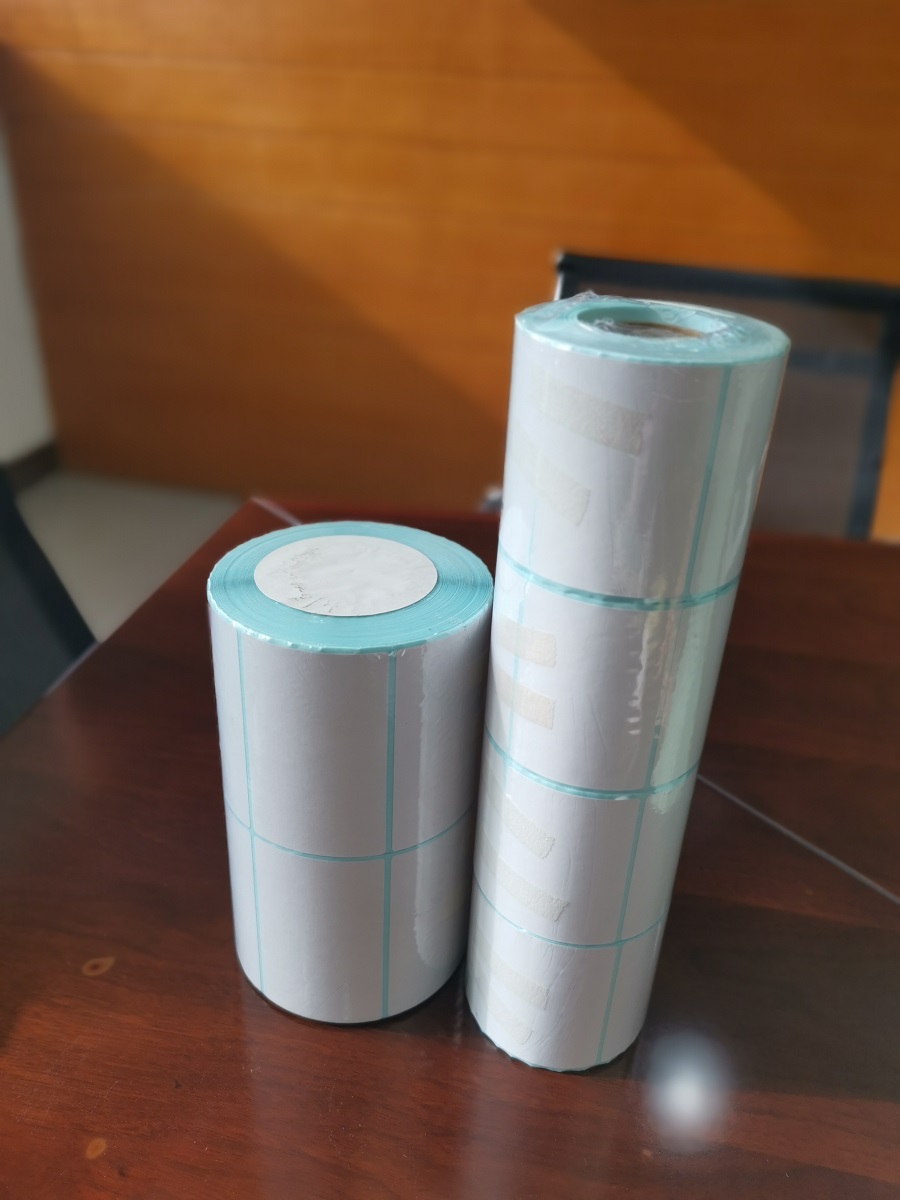 THERMAL PAPER STICKER IN SMALL ROLL